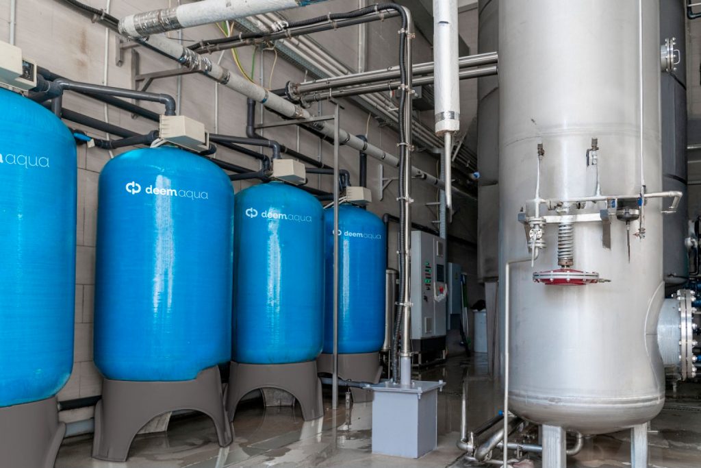 stock-photo-drinking-water-factory-or-plant-production-industrial-interior-large-metal-tanks-for-filtering-1531629014-transformed-1-1024x683